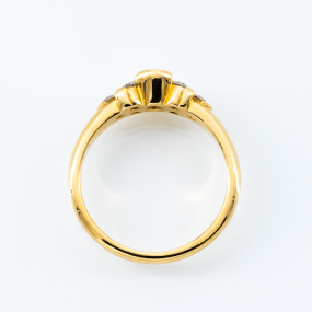 Bague demi serti clos en or jaune et 7 diamants